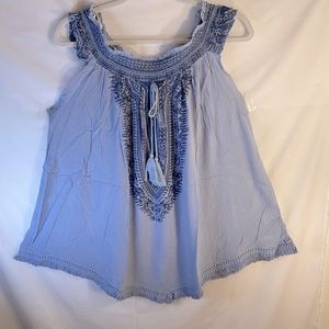 Roaman’s sleeveless shirt